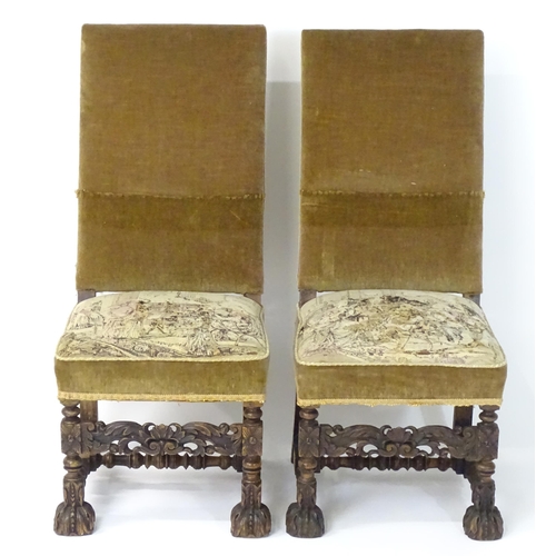 593 - A pair of late 19thC side chairs with rectangular backrests above sprung seats and carved oak legs w... 