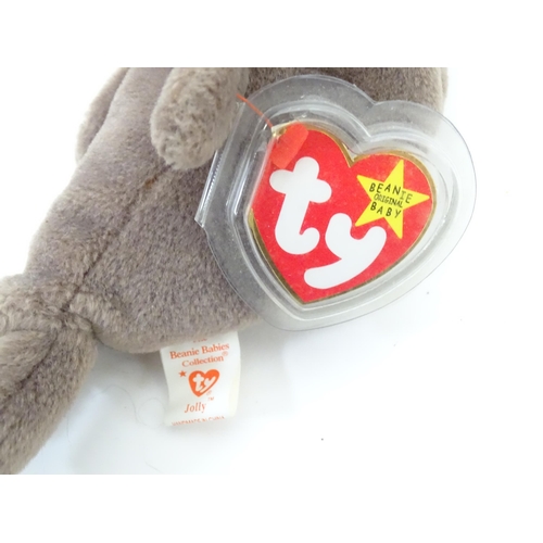 195 - Toys: A quantity of assorted soft toys to include TY Beanie Baby bears, octopus, monkey, lion, pengu... 