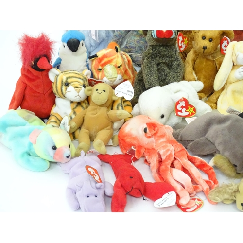 195 - Toys: A quantity of assorted soft toys to include TY Beanie Baby bears, octopus, monkey, lion, pengu... 