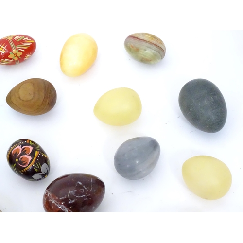 204 - Assorted hardstone eggs / hand warmers etc