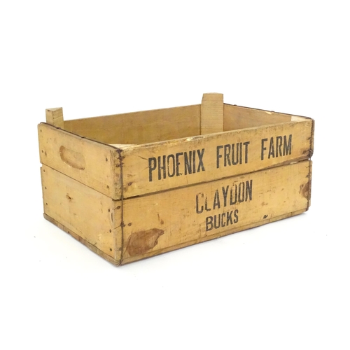 A 20thC wooden fruit crate stamped Phoenix Fruit Farm, Claydon, Bucks. Approx. 7 1/4" x 17" x 12"