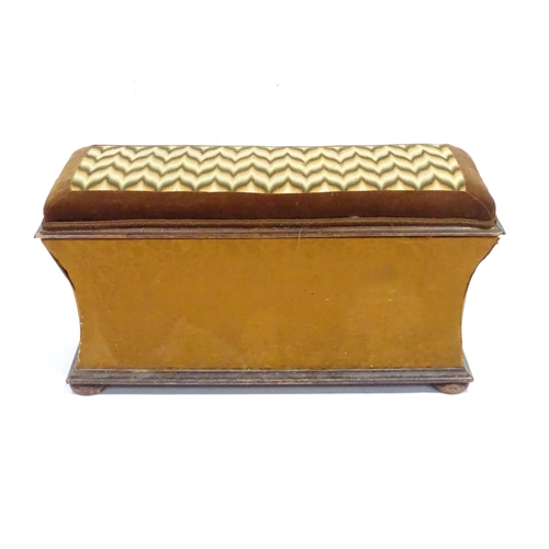 333 - A 20thC Ottoman with upholstered hinged top and raised on squat bun feet measuring . Approx 30