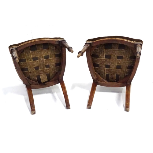 346 - A pair of early 20thC walnut side chairs raised on fluted tapering front legs