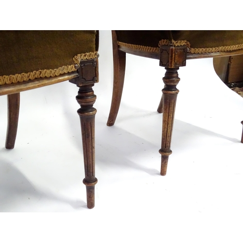 346 - A pair of early 20thC walnut side chairs raised on fluted tapering front legs