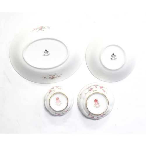 352 - A quantity of tea / dinner wares in the Victoriana Rose pattern to include, tea cups and saucers, pl... 