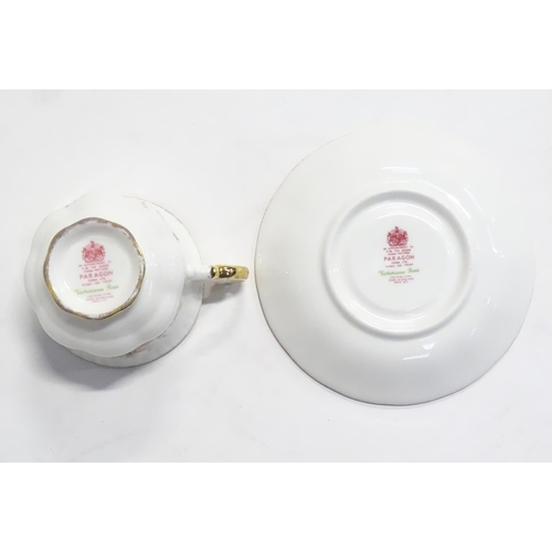 352 - A quantity of tea / dinner wares in the Victoriana Rose pattern to include, tea cups and saucers, pl... 
