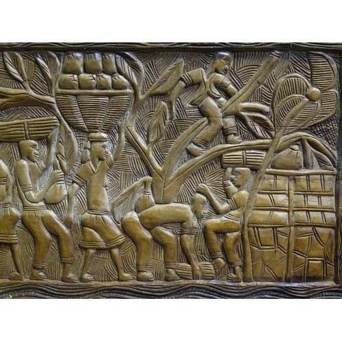 347 - Two tribal carved wooden panels, one depicting a harvest scene with figures. Largest approx. 18