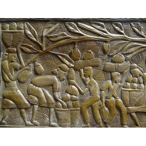 347 - Two tribal carved wooden panels, one depicting a harvest scene with figures. Largest approx. 18
