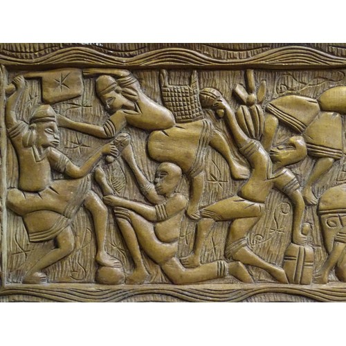 347 - Two tribal carved wooden panels, one depicting a harvest scene with figures. Largest approx. 18