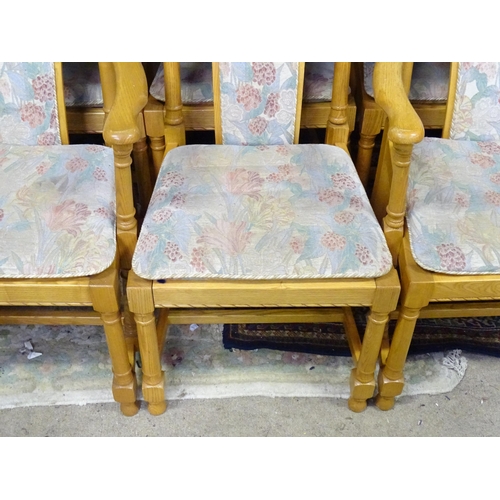 918 - Six Ercol upholstered dining chairs to include two carvers. Approx. 43