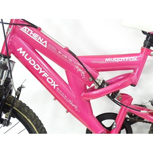 961 - A girls pink Athena Muddy Fox mountain bike