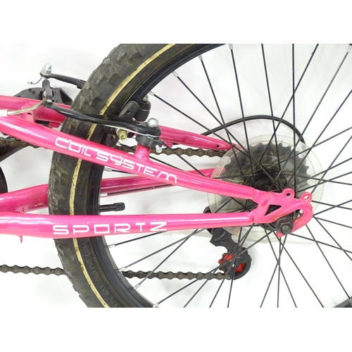 961 - A girls pink Athena Muddy Fox mountain bike