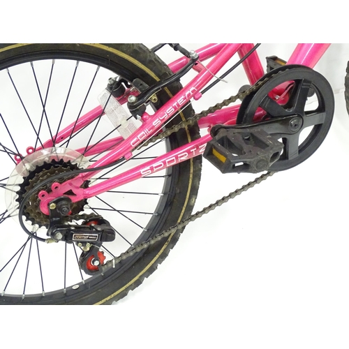 961 - A girls pink Athena Muddy Fox mountain bike