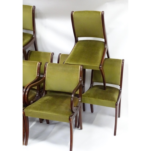 962 - A set of eight mid to late 20thC dining chairs (6+2), of afrormosia construction with olive green up... 