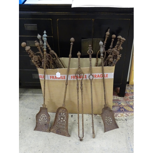 378 - A quantity of assorted fire tools to include shovels, tongs etc.