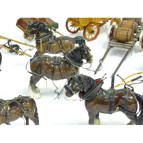 356 - A large quantity of ceramic horses with wooden carriages / wagons / buggies / carts, etc. To include... 