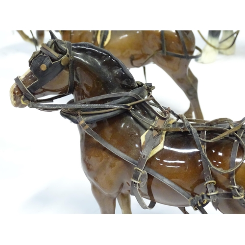 356 - A large quantity of ceramic horses with wooden carriages / wagons / buggies / carts, etc. To include... 