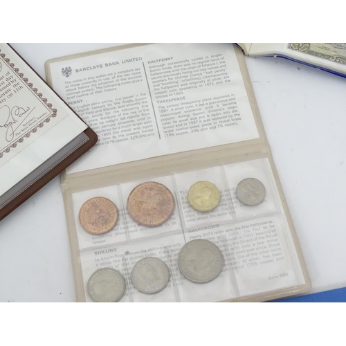 468 - A quantity of assorted banknotes and coins, including a framed presentation set entitled 'British Ba... 