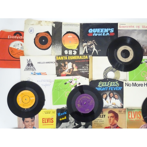 600 - A quantity of assorted mid to late 20thC vinyl records, including five picture-sleeve Elvis Presley ... 