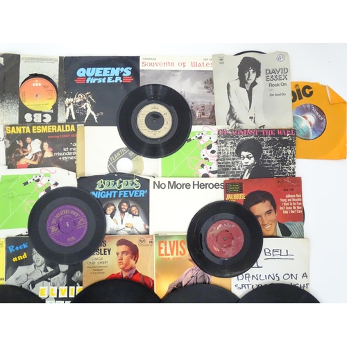 600 - A quantity of assorted mid to late 20thC vinyl records, including five picture-sleeve Elvis Presley ... 