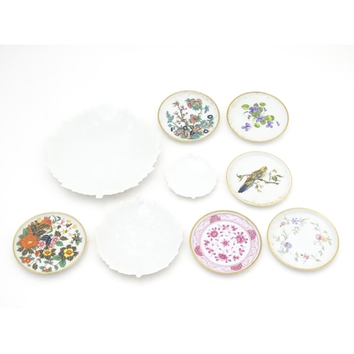 912 - A quantity of Kaiser ceramics to include three leaf dishes, and six pin dishes of circular form deco... 