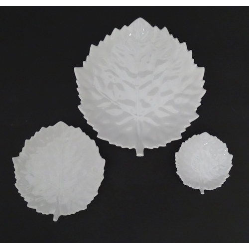 912 - A quantity of Kaiser ceramics to include three leaf dishes, and six pin dishes of circular form deco... 