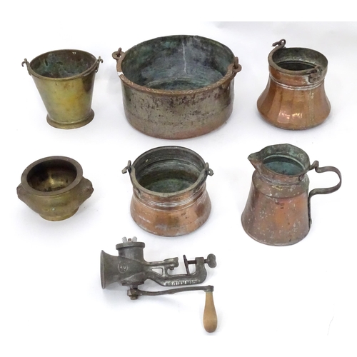 58 - A quantity of assorted of copper and brassware to include pans with swing handles, jug, etc.