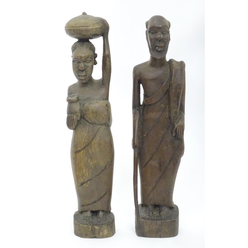 104 - A quantity of assorted tribal items to include figural busts, carved figures, etc.