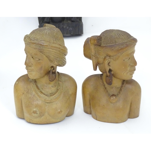 104 - A quantity of assorted tribal items to include figural busts, carved figures, etc.