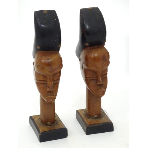 104 - A quantity of assorted tribal items to include figural busts, carved figures, etc.