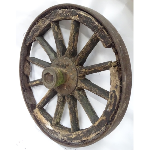 79 - An old cart wheel. Approx 36