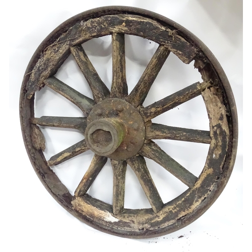 79 - An old cart wheel. Approx 36