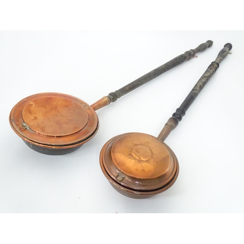 83 - Two bed warming pans and a copper kettle (3)