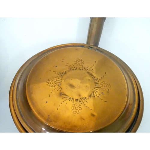 83 - Two bed warming pans and a copper kettle (3)