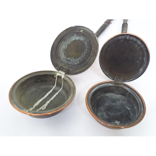 83 - Two bed warming pans and a copper kettle (3)