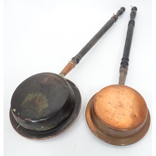 83 - Two bed warming pans and a copper kettle (3)