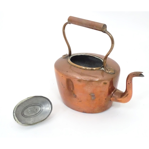 83 - Two bed warming pans and a copper kettle (3)