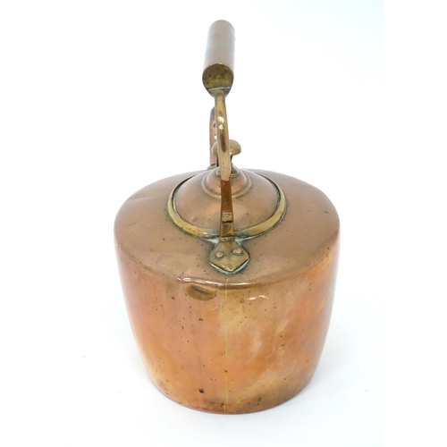 83 - Two bed warming pans and a copper kettle (3)