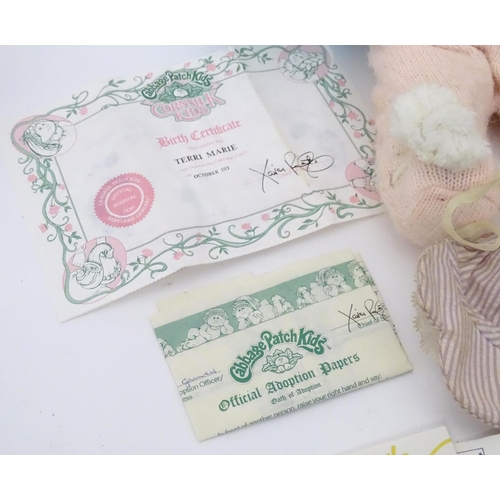 85 - Toys: A quantity of assorted Cabbage Patch Kids dolls etc - some with certificates, to include a Tal... 