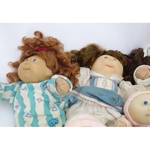 85 - Toys: A quantity of assorted Cabbage Patch Kids dolls etc - some with certificates, to include a Tal... 