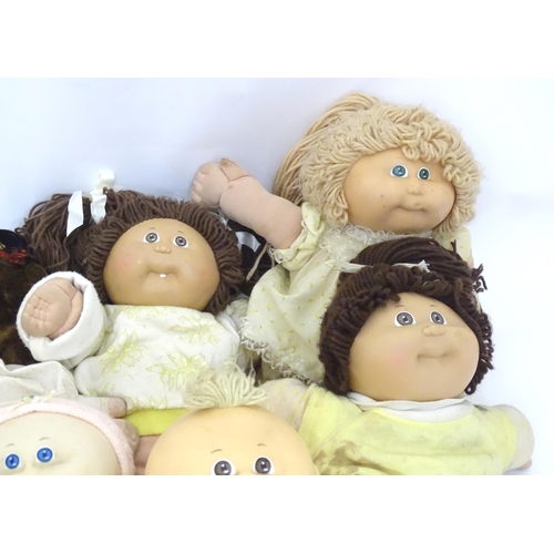 85 - Toys: A quantity of assorted Cabbage Patch Kids dolls etc - some with certificates, to include a Tal... 