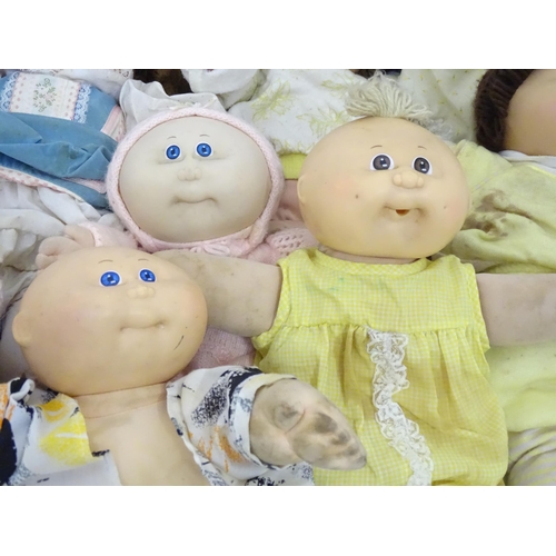 85 - Toys: A quantity of assorted Cabbage Patch Kids dolls etc - some with certificates, to include a Tal... 