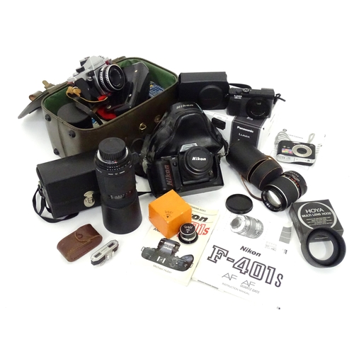 93 - A quantity of film and digital cameras to include a cased Nikon F-401s camera, a cased Pentacon Prak... 