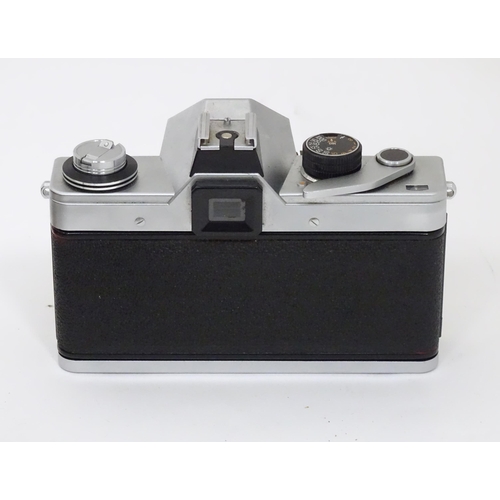 93 - A quantity of film and digital cameras to include a cased Nikon F-401s camera, a cased Pentacon Prak... 