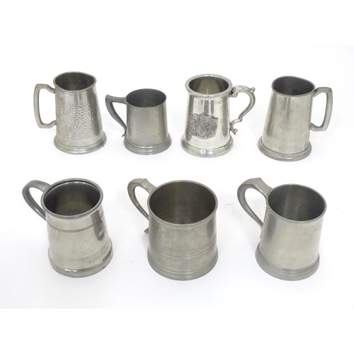 94 - A quantity of assorted pewter tankards