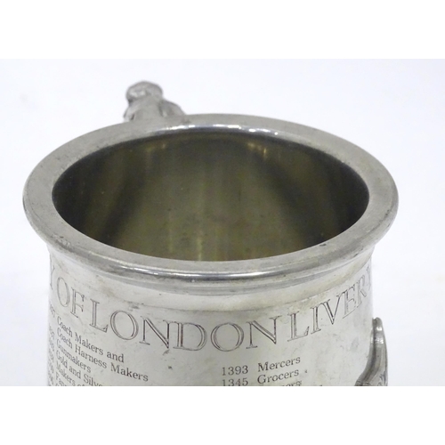 94 - A quantity of assorted pewter tankards