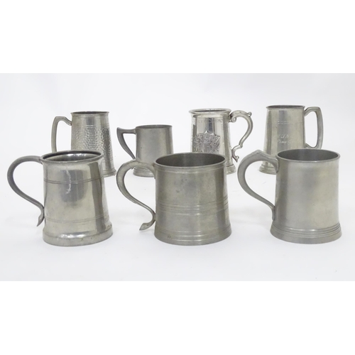 94 - A quantity of assorted pewter tankards