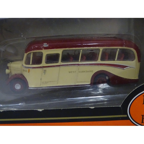 99 - Four Exclusive First Editions die cast scale model buses comprising Leyland TS8 Tiger Type B Lancash... 