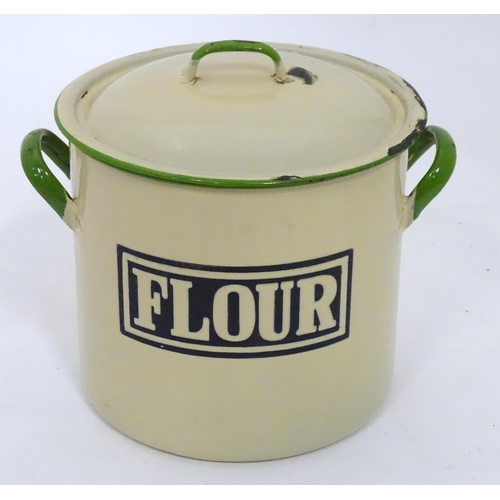 107 - A flour tin with enamel detail. Approx 9