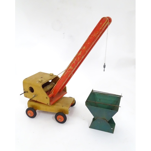 109 - Toy: A scratch built wooden crane with painted detail. Approx. 17